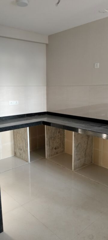 Kitchen in 2 BHK Apartment at Godrej Nest Kandivali, Kandivali East – for Rent