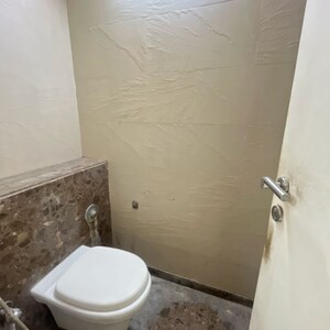 Bathroom in 2.5 BHK Apartment at Kalpataru Towers, Defence Colony – for Rent