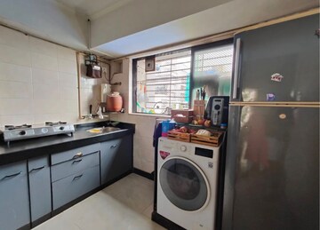 Kitchen in 3 BHK Apartment at Pearl Prabha Apartment, Andheri West – for Sale