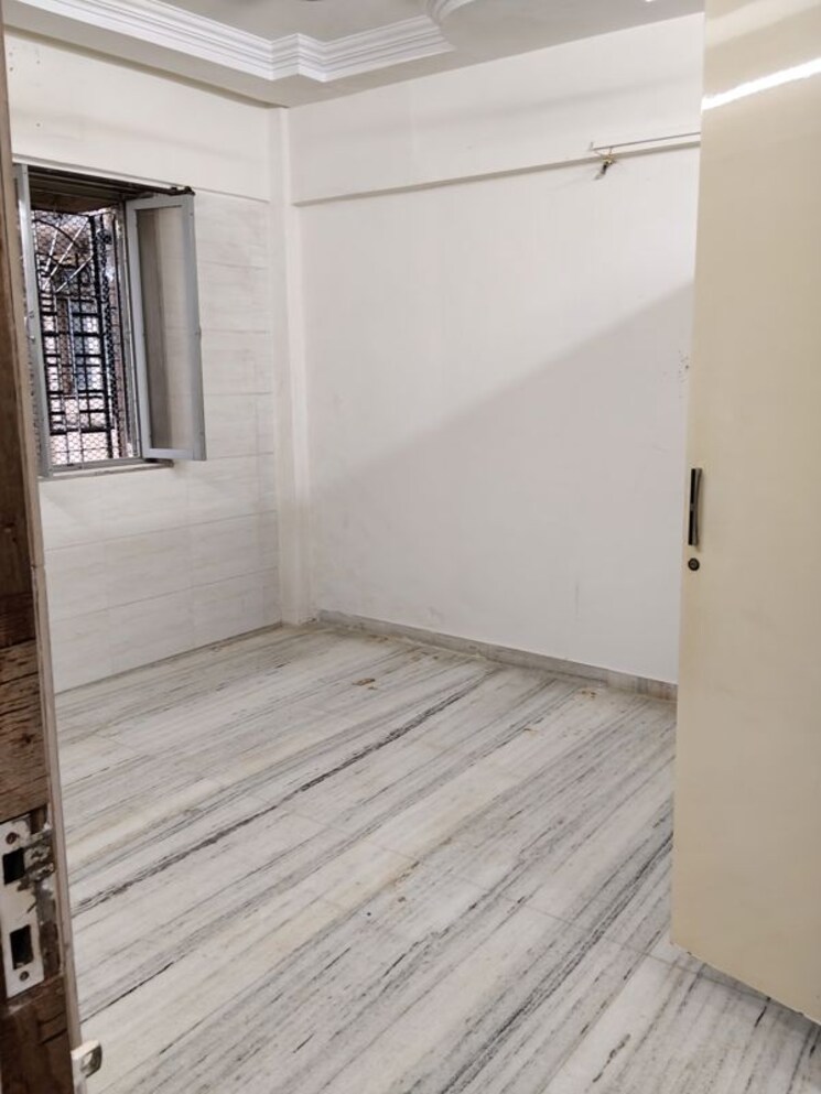 Master Bedroom, kamla-nagar-chs 1 Bedroom 576 Sq.Ft. Apartment In Kandivali West Mumbai 9749512