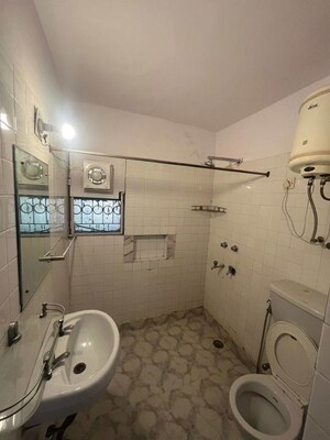 Bathroom in 3 BHK Apartment at Vasant Kunj Enclave – for Rent