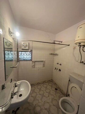 Bathroom in 3 BHK Apartment at Vasant Kunj Enclave – for Rent