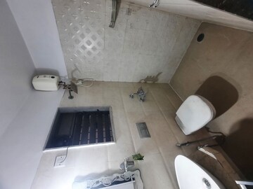 Bathroom in 2 BHK Apartment at Raunak Unnathi Woods Phase 4 And 5, Ghodbunder Road – for Rent