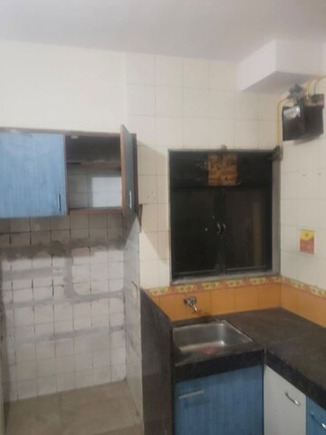 Kitchen in 1 BHK Apartment at Rutu Estate, Brahmand – for Rent