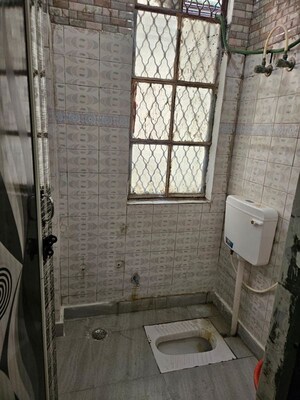 Bathroom in 2 BHK Apartment at Dilshad Colony – for Sale