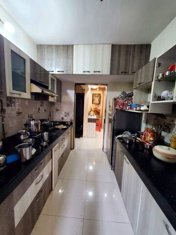 Kitchen in 2 BHK Apartment at Cosmos Empress Park, Ghodbunder Road – for Sale