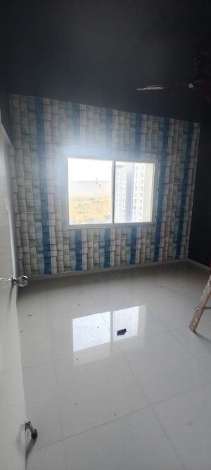 Living Room in 1 BHK Apartment at Godrej Prana, Undri – for Sale