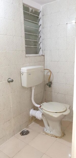 Bathroom in 2 BHK Apartment at Sector 18 Kopar Khairane – for Rent