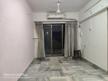Living Room in 1 BHK Apartment at Evening Glory, Chandivali – for Rent