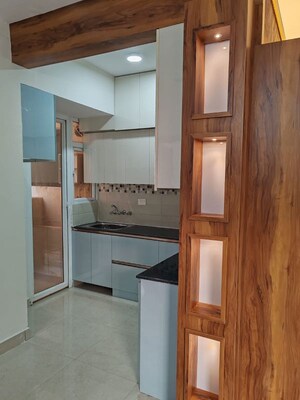 Kitchen in 2 BHK Apartment at Signature Orchard Avenue 2, Sector 93 – for Rent