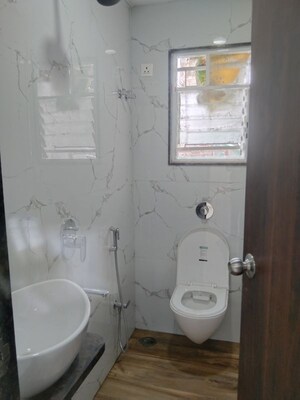 Bathroom in 2 BHK Apartment at Mhalgi Nagar – for Rent