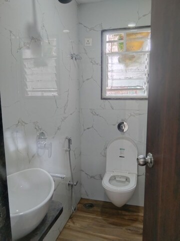 Bathroom in 2 BHK Apartment at Mhalgi Nagar – for Rent