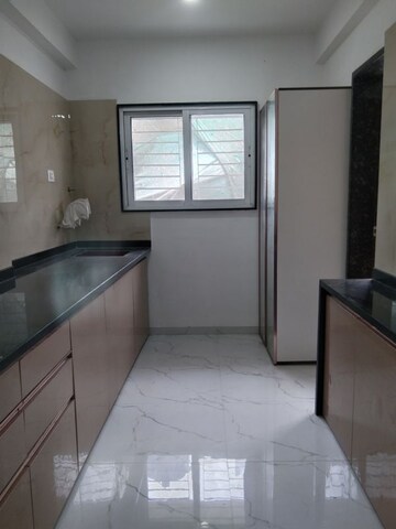 Kitchen in 2 BHK Apartment at Mhalgi Nagar – for Rent