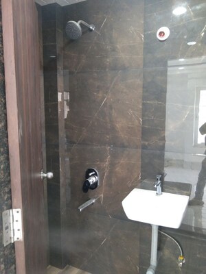 Bathroom in 2 BHK Apartment at Mhalgi Nagar – for Rent