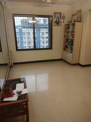 Living Room in 1 BHK Apartment at Raunak Bliss, Ghodbunder Road – for Rent