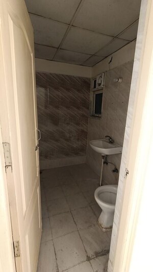 Bathroom in 2 BHK Apartment at Antriksh Golf View, Sector 78 – for Rent