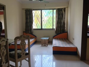 Living Room in 2 BHK Apartment at Kalpataru Classic, Malad West – for Rent