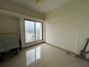 Room in 2 BHK Apartment at Dhayari – for Sale