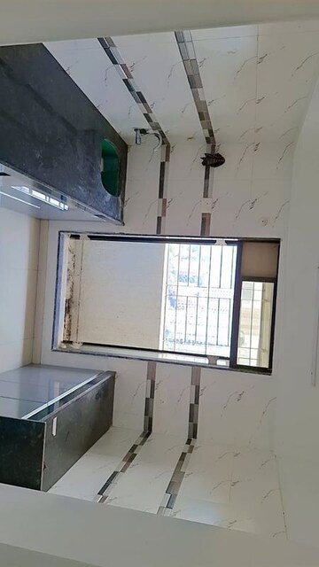 Kitchen in 2 BHK Apartment at Dynamic Crest, Shilphata – for Rent