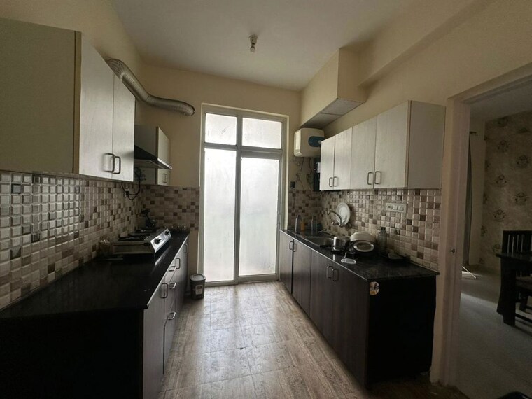 Kitchen, ansal-api-celebrity-gardens 3 Bedroom 1755 Sq.Ft. Apartment In Sushant Golf City Lucknow 9750448