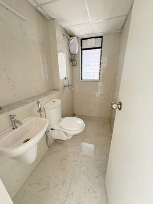 Bathroom in 3 BHK Apartment at Runwal Gardens Phase 2, Dombivli East – for Rent