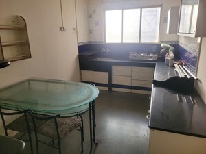 Kitchen in 2 BHK Apartment at Angal Utkarsha, Model Colony – for Rent