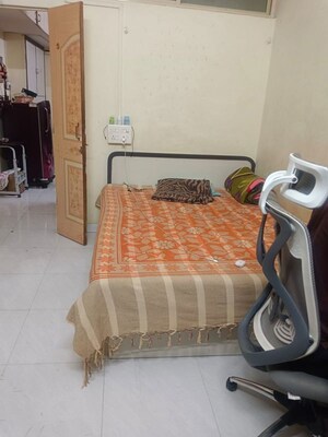 Bedroom in 1 BHK Apartment at Urmila CHS Dhankawadi, Dhankawadi – for Rent