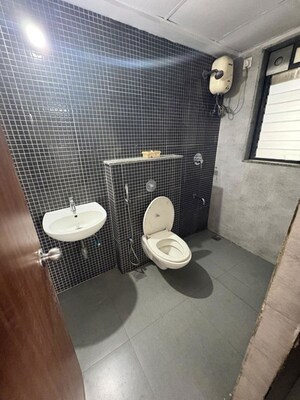 Bathroom in 2 BHK Apartment at Lodha Lakeshore Greens, Dombivli East – for Rent
