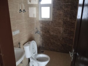 Bathroom in 3 BHK Apartment at Omaxe The Palace, Gomti Nagar – for Rent