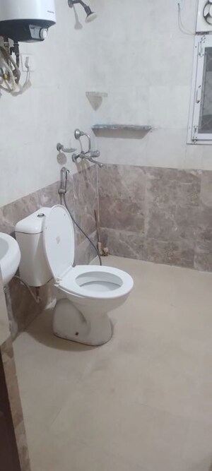 Bathroom in 2 BHK Apartment at Gardenia Golf City, Sector 75 – for Rent