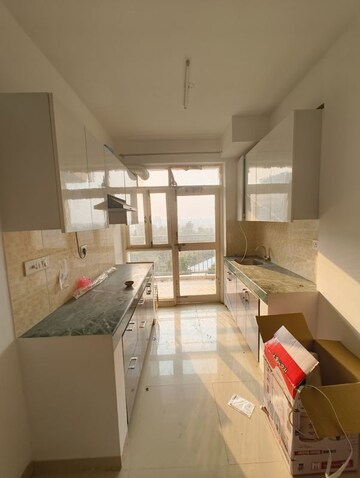 Kitchen in 2 BHK Apartment at Adani Aangan, Sector 89a – for Sale