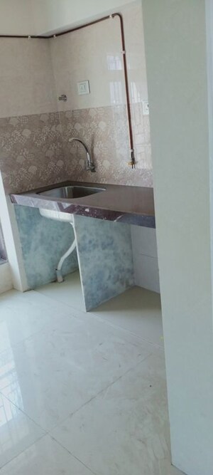 Bathroom in 1 BHK Apartment at Bindra Complex, Andheri East – for Sale