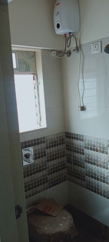 Bathroom in 1 BHK Apartment at Bindra Complex, Andheri East – for Sale