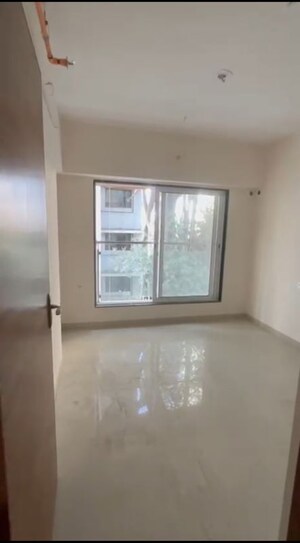 Room in 2 BHK Apartment at Je and Vee Madhuban, Malad East – for Sale