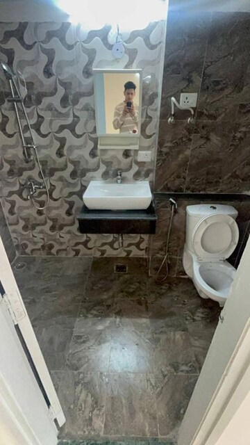 Bathroom in 2 BHK Apartment at Shri Radha Sky Gardens, Sector 16b Greater Noida – for Rent