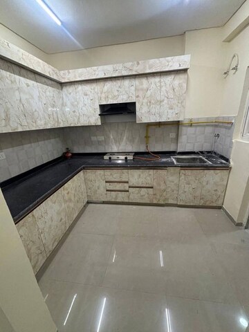 Kitchen in 3 BHK Apartment at Shri Radha Sky Gardens, Sector 16b Greater Noida – for Rent