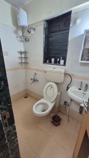 Bathroom in 2 BHK Apartment at Hubtown Akruti Orchid Park, Sakinaka – for Rent
