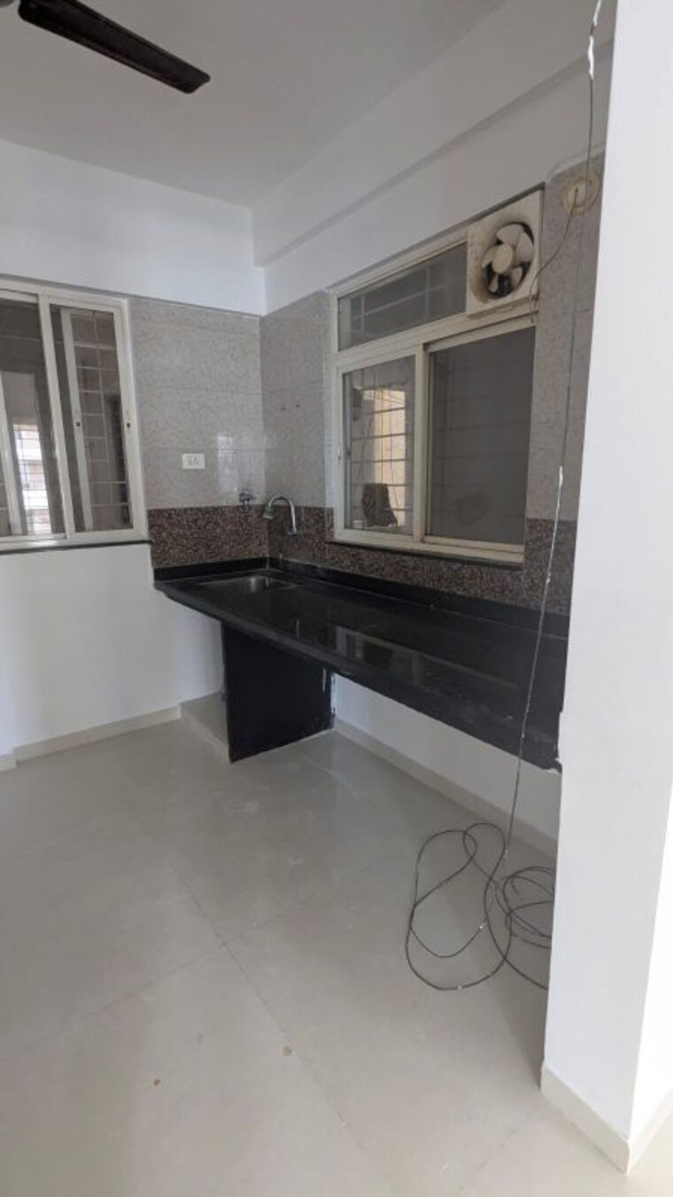 Kitchen, ag-west-one 2 Bedroom 750 Sq.Ft. Apartment In Wakad Pune 9751087