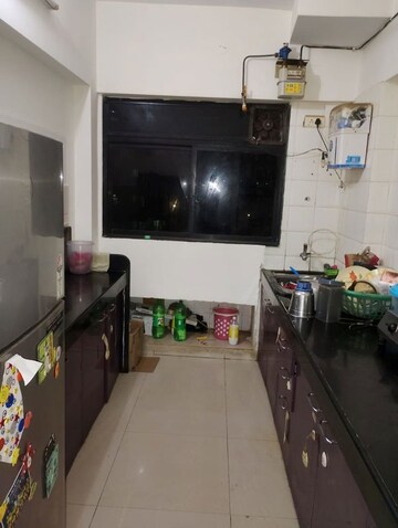 Kitchen in 2 BHK Apartment at Ajmera Bhakti Park, Bhakti Park – for Rent