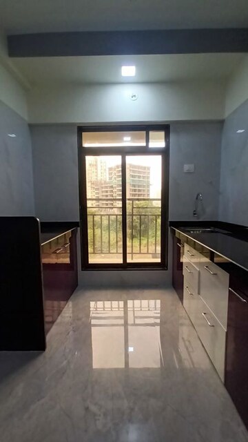 Kitchen in 1 BHK Apartment at Shree Anant Tower, Morya Nagar – for Sale