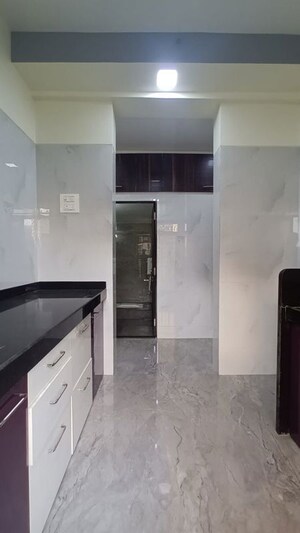 Kitchen in 1 BHK Apartment at Shree Anant Tower, Morya Nagar – for Rent