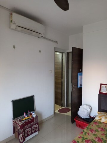 Living Room in 1 BHK Apartment at Kanakia Rainforest, Andheri East – for Rent