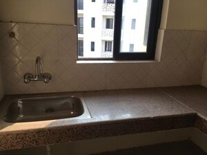 Bathroom in 2 BHK Apartment at Shalimar Mannat, Faizabad Road – for Sale