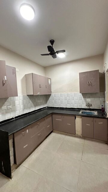 Kitchen in 2 BHK Apartment at Shri Radha Sky Park, Sector 16b Greater Noida – for Rent