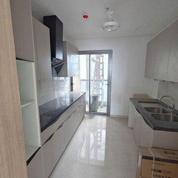 Kitchen in 4 BHK Apartment at Rustomjee Crown, Gokhale Road – for Rent