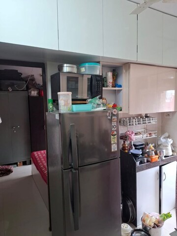 Kitchen in 1 BHK Apartment at Raunak Delight, Owale – for Rent