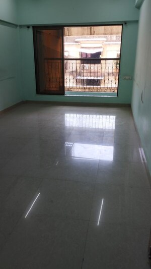 Living Room in 1 BHK Apartment at Vighnahatra Modern Enclave, Agripada – for Sale