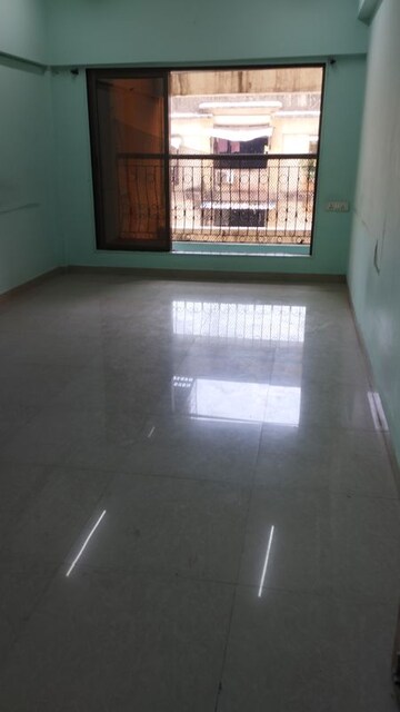 Living Room in 1 BHK Apartment at Vighnahatra Modern Enclave, Agripada – for Sale