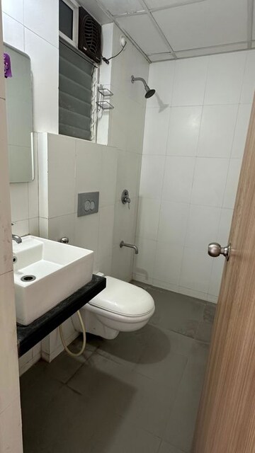 Bathroom in 1 BHK Apartment at KIPL Morya, Kasarvadavali – for Rent