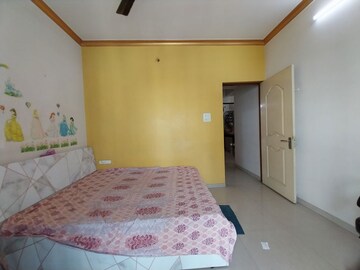 Bedroom in 2 BHK Apartment at Nandwara Elite Enclave, Kopar Khairane – for Rent